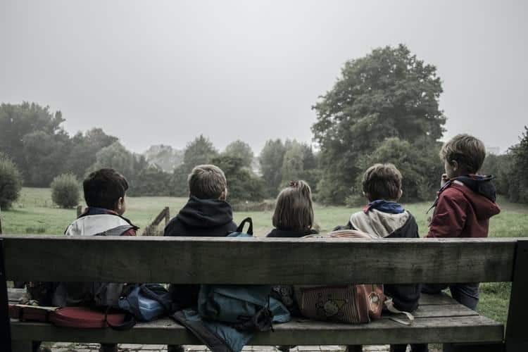 Children socializing outside.