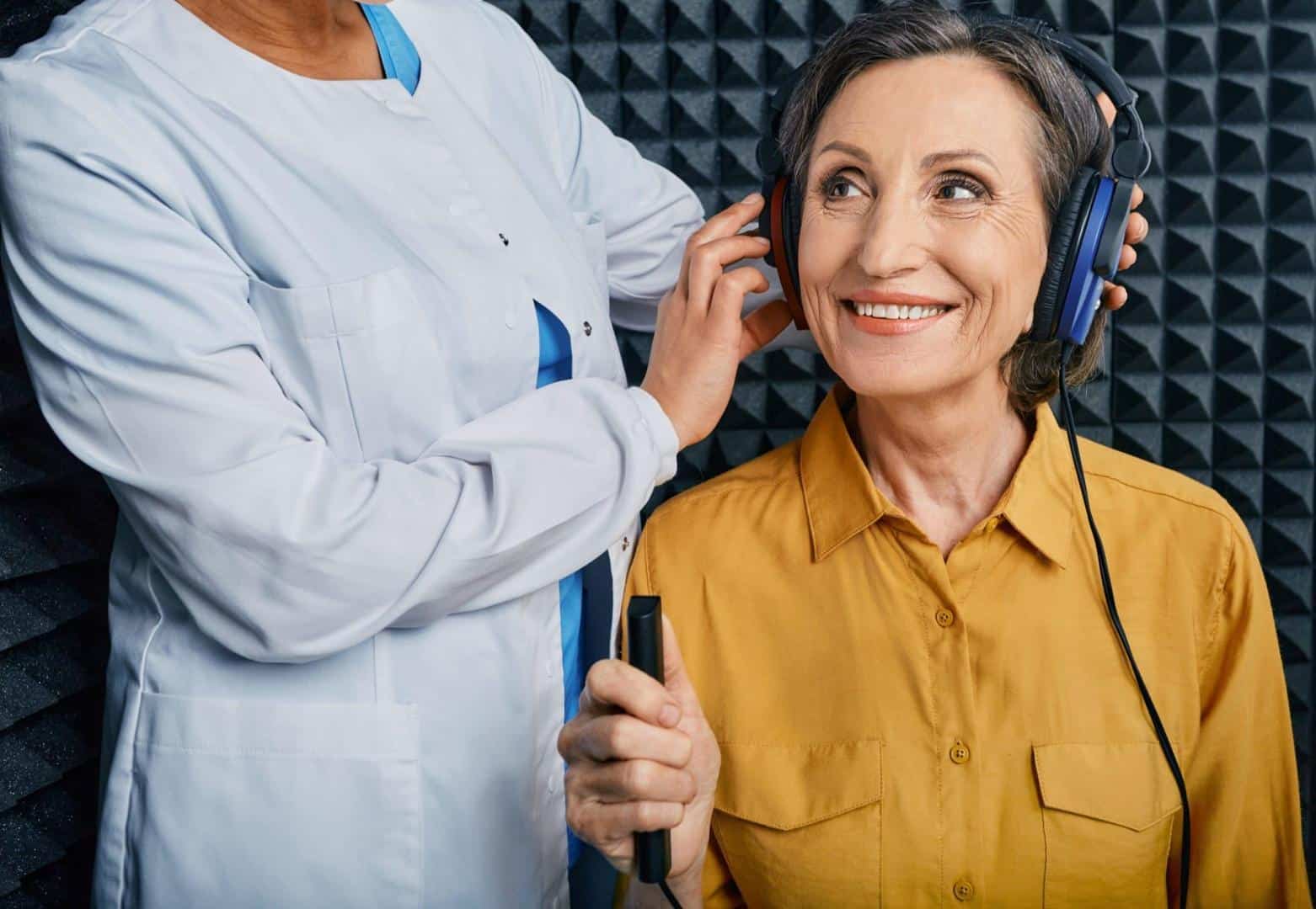 Senior woman getting a hearing test.