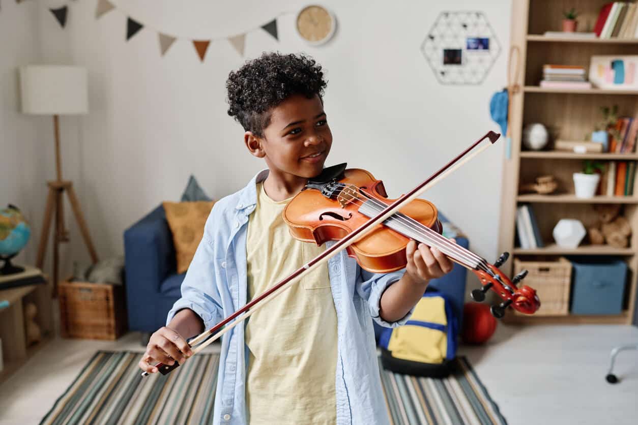 Boy plays violin